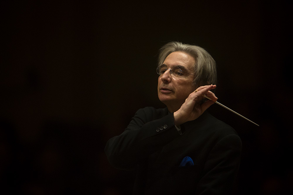 The elegant conductor Michael Tilson Thomas leading the San Francisco Symphony in a live performance from Carnegie Hall on November 13, 2013. (Eric Thayer for NPR)