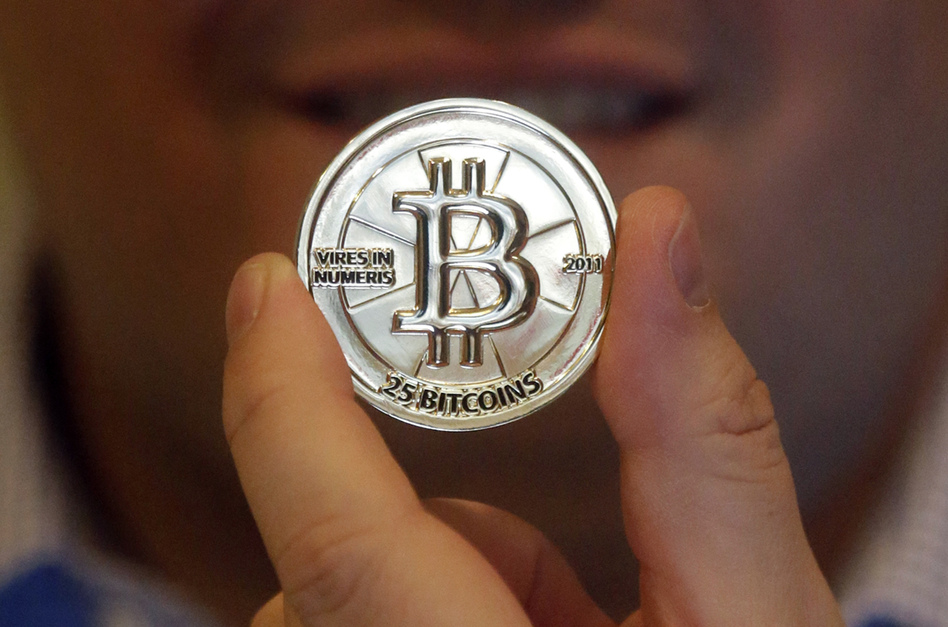 Bitcoins have gone from an Internet oddity to much more. The FEC is now considering allowing the virtual currency to fund some political campaigns. (Rick Bowmer/AP)
