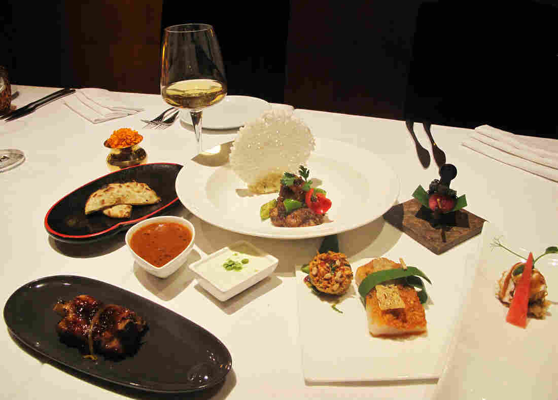 For fine dining, one can splash out for the tasting menu at an upscale restaurant like Indian Accent. Starters include baked fish in Amritsari masala butter with Japanese whitebait papad for crunch; and meetha achaar Chilean spare ribs with mango chutney. It's less than $100 per person for the nonvegetarian option with wine pairings, and only $45 without the wine.