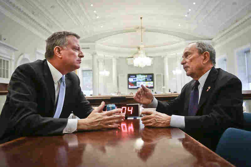 New York City Mayor-elect Bill de Blasio (left) joins Bloomberg for a meeting in the "Bull Pen," the mayor's main City Hall office, on Nov. 6.