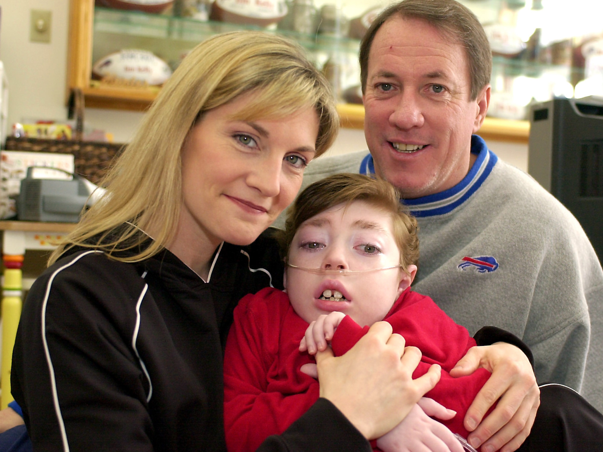 Jim and Jill Kelly with their son Hunter in 2004. Hunter, who had Krabbe disease, died in 2005 at age 8.