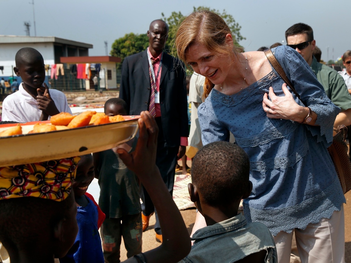 Samantha Power greets children on Thursday at a makeshift refugee camp in Central African Republic, where more than 40,000 people have found refuge from sectarian violence.