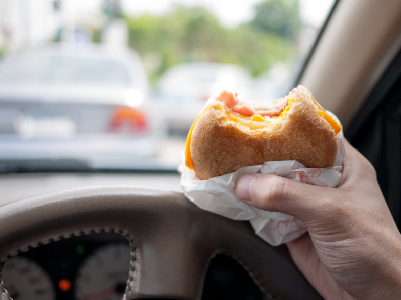You can do it. But your 16-year-old can't. Teens were more likely to have accidents while eating or talking in the car. (iStockphoto)