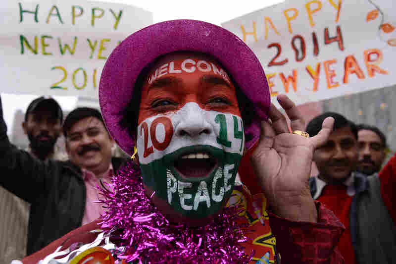 A reveler poses on New Year's Eve in Amritsar, India.