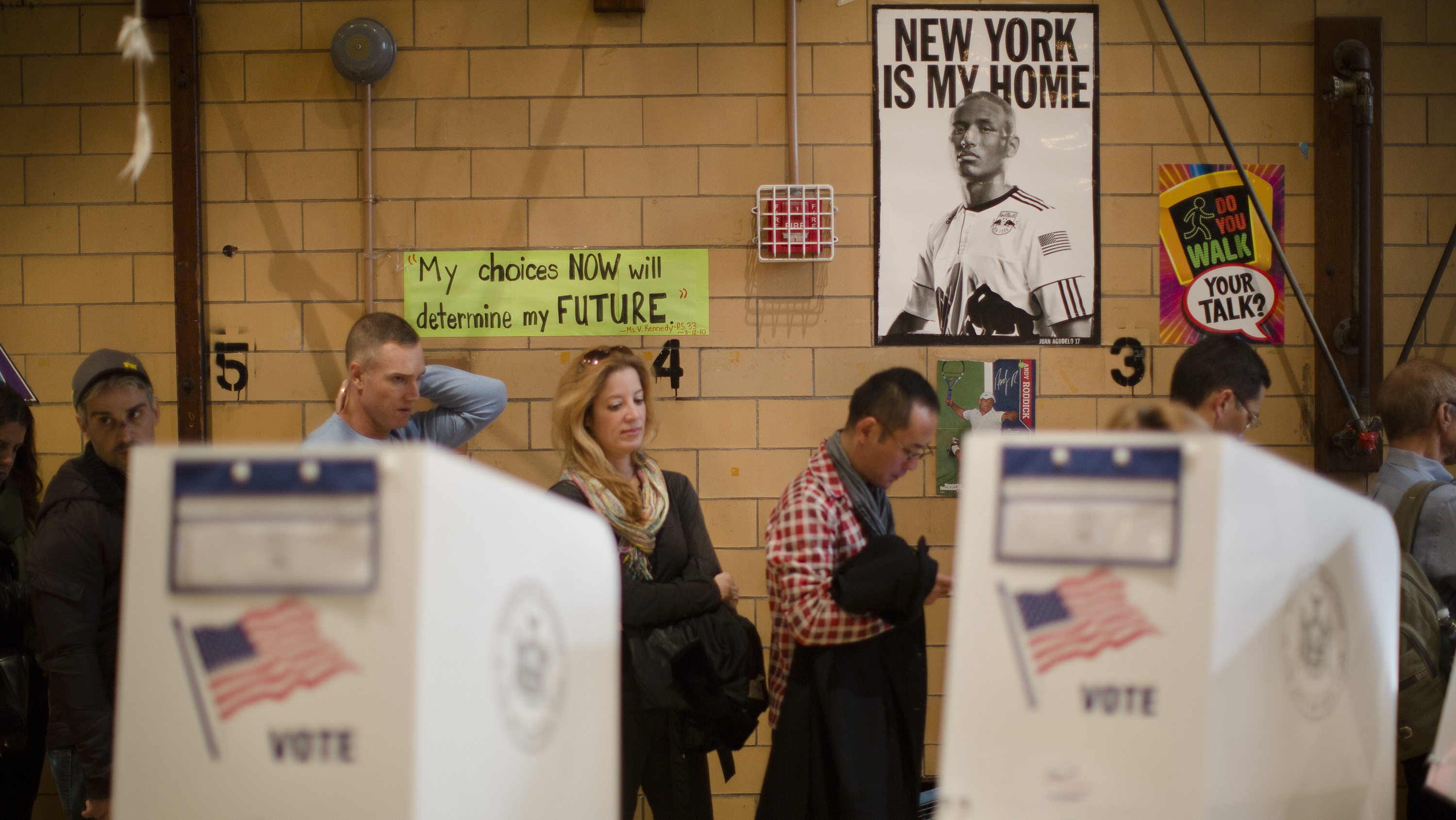 Voters wait to cast ballots at a school in New York City on Nov. 6.