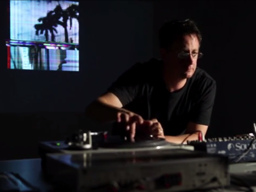 Adam Brown "DJing" his photos