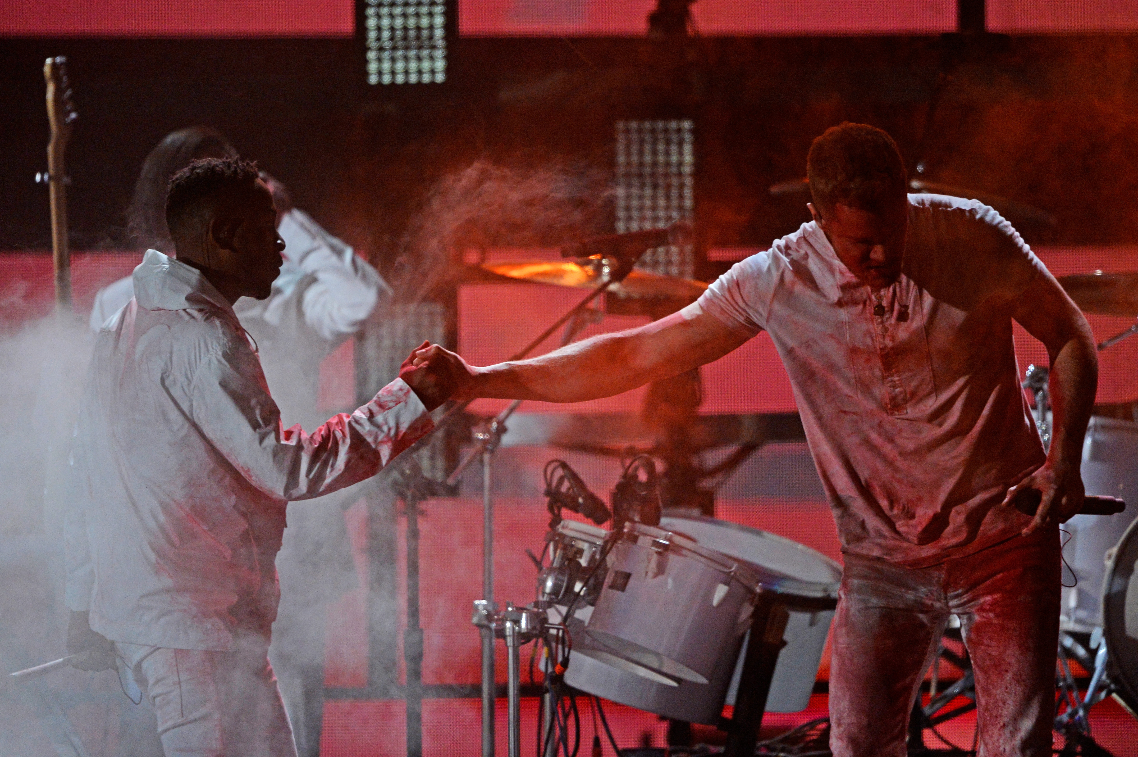 Kendrick Lamar and Dan Reynolds of Imagine Dragons onstage during the 56th Grammy Awards. (Getty Images)