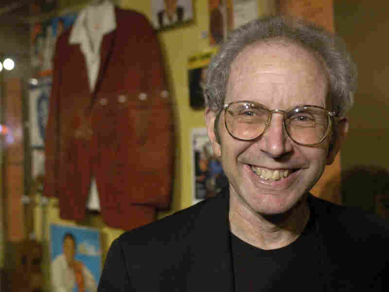Author Peter Guralnick poses with Sam Cooke memorabilia at the Rock and Roll Hall of Fame, in Cleveland, Ohio, on Nov. 4, 2005.