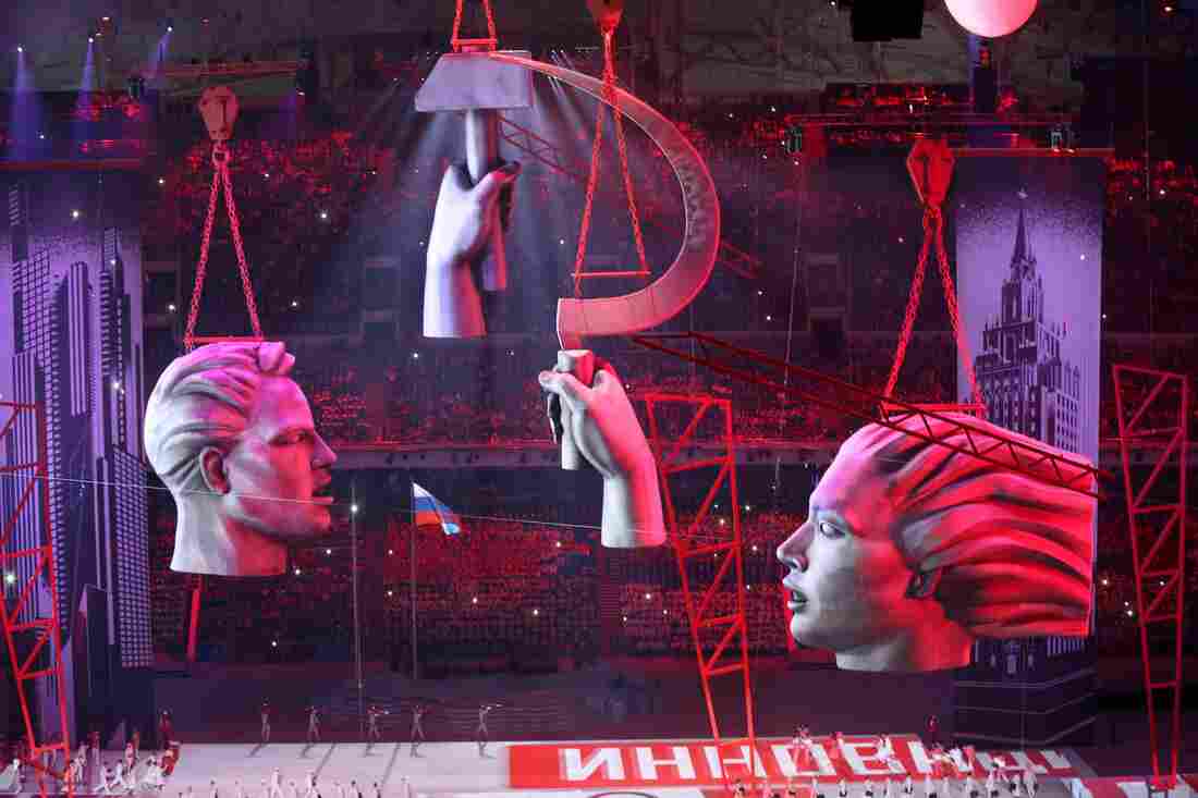 Scissor-lift platforms and banners create an urban landscape during the Opening Ceremony of the Sochi 2014 Olympic Games at the Fisht Olympic Stadium on Friday.