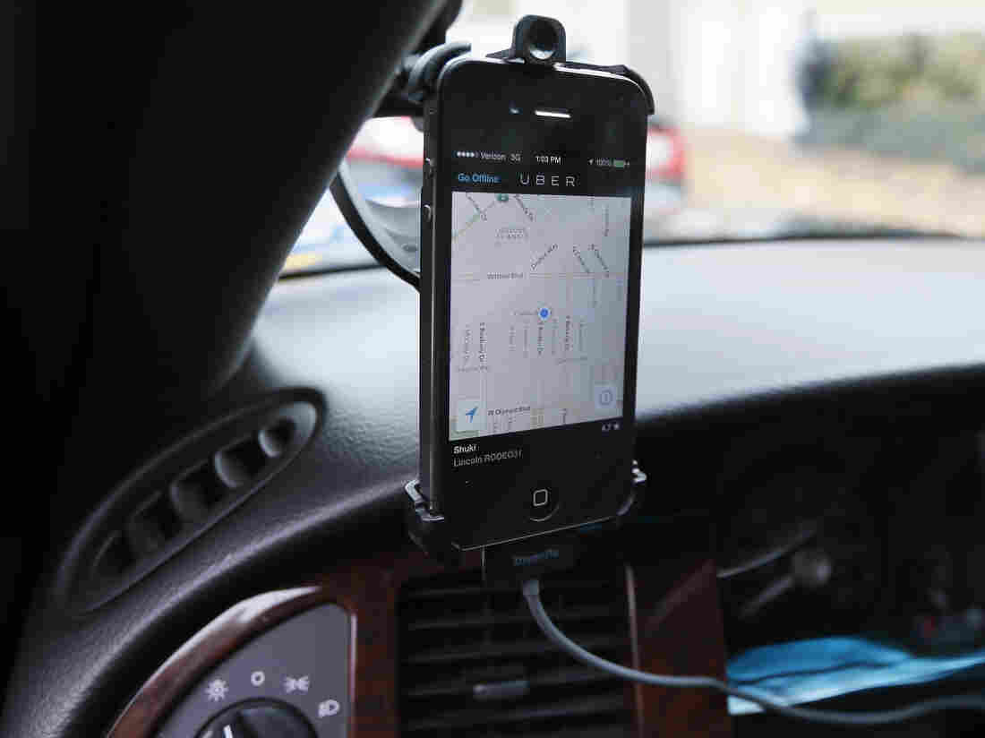 Image #: 26305792 Transportation app Uber is seen on the iPhone of limousine driver Shuki Zanna, 49, in Beverly Hills, California, December 19, 2013. Photo taken December 19, 2013. REUTERS/Lucy Nicholson (UNITED STATES - Tags: BUSINESS TRANSPORT) REUTERS /LUCY NICHOLSON /LANDOV