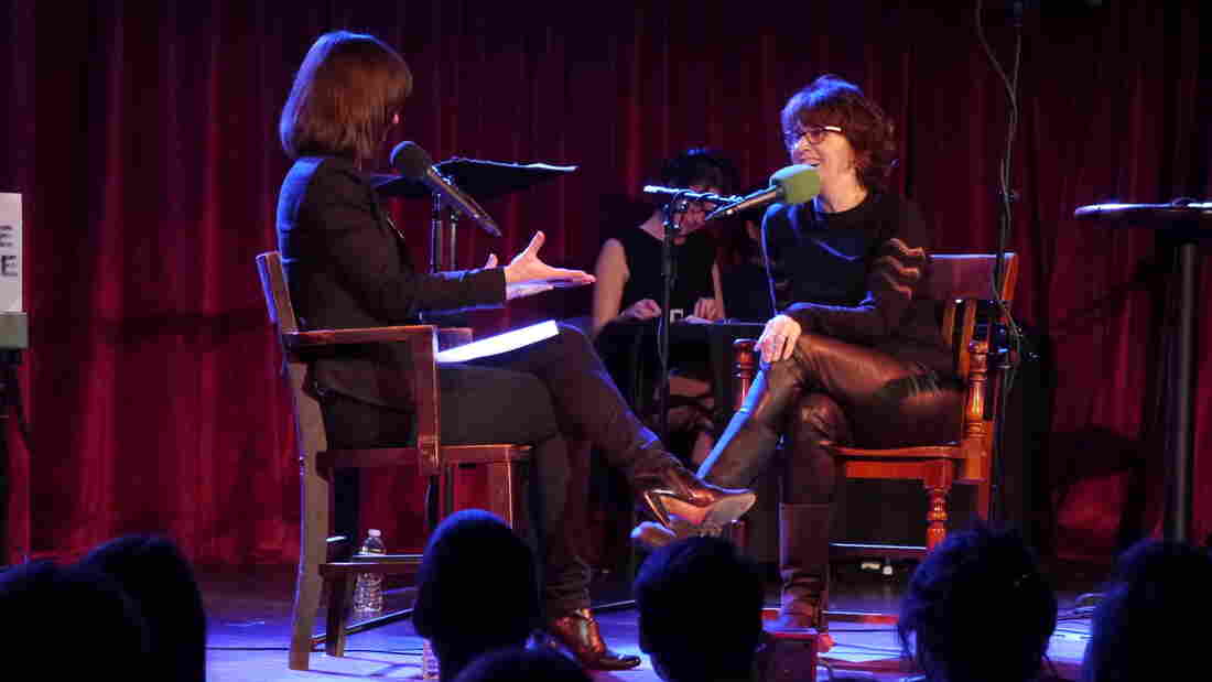 Ask Me Another host Ophira Eisenberg chats with Very Important Puzzler Delia Ephron on stage at The Bell House in Brooklyn, NY.