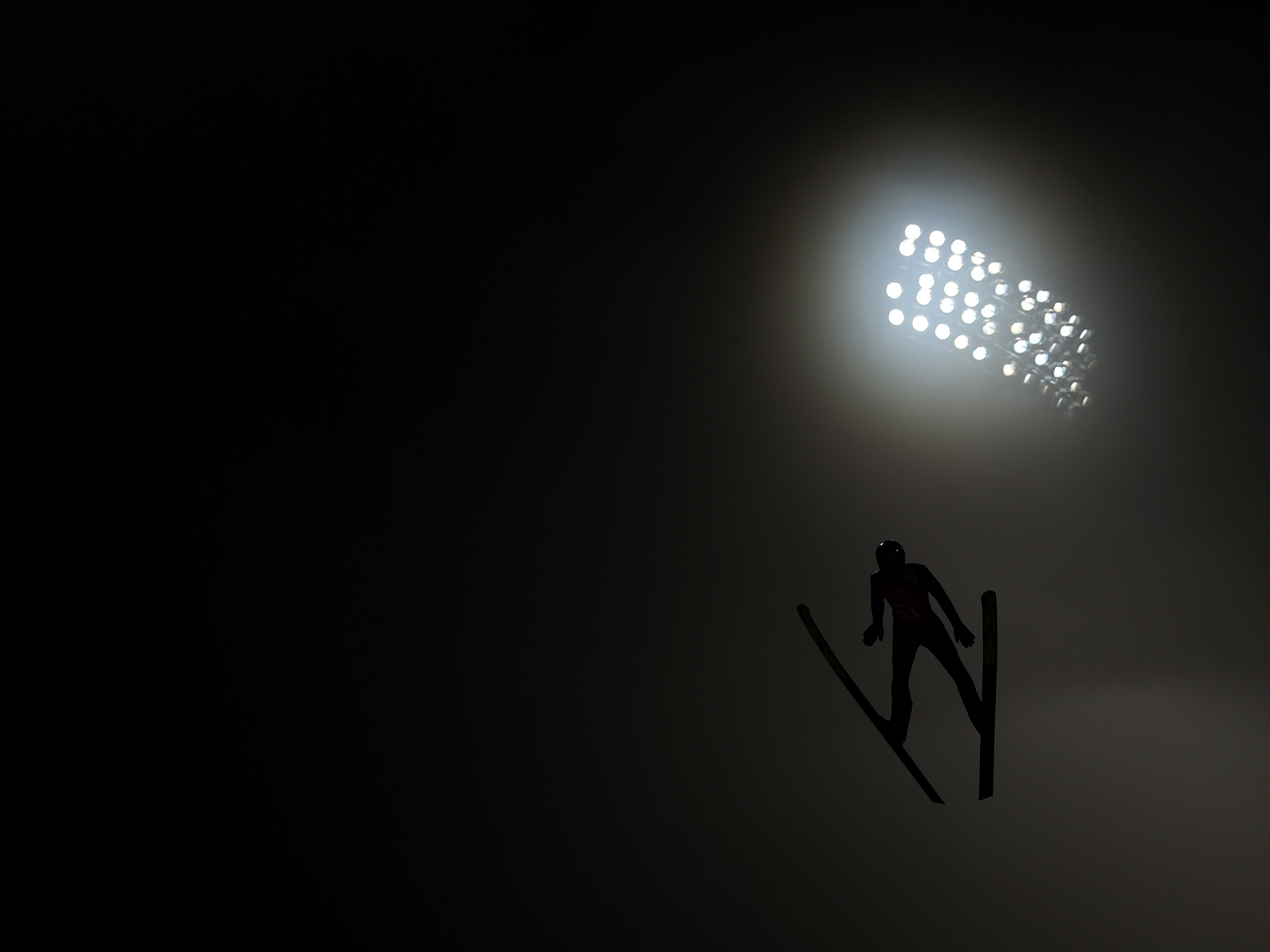 Olympic Photo Of The Day: Jumping Through The Fog - NPR