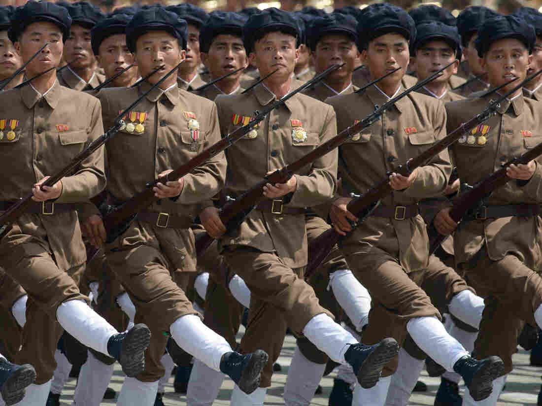 North Korean soldiers marching through Kim Il-Sung Square in Pyongyang.
