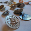 No, these aren't real bitcoins (just Bitcoin buttons). Fans of the virtual currency see several real benefits, including the elimination of fees for transferring money.