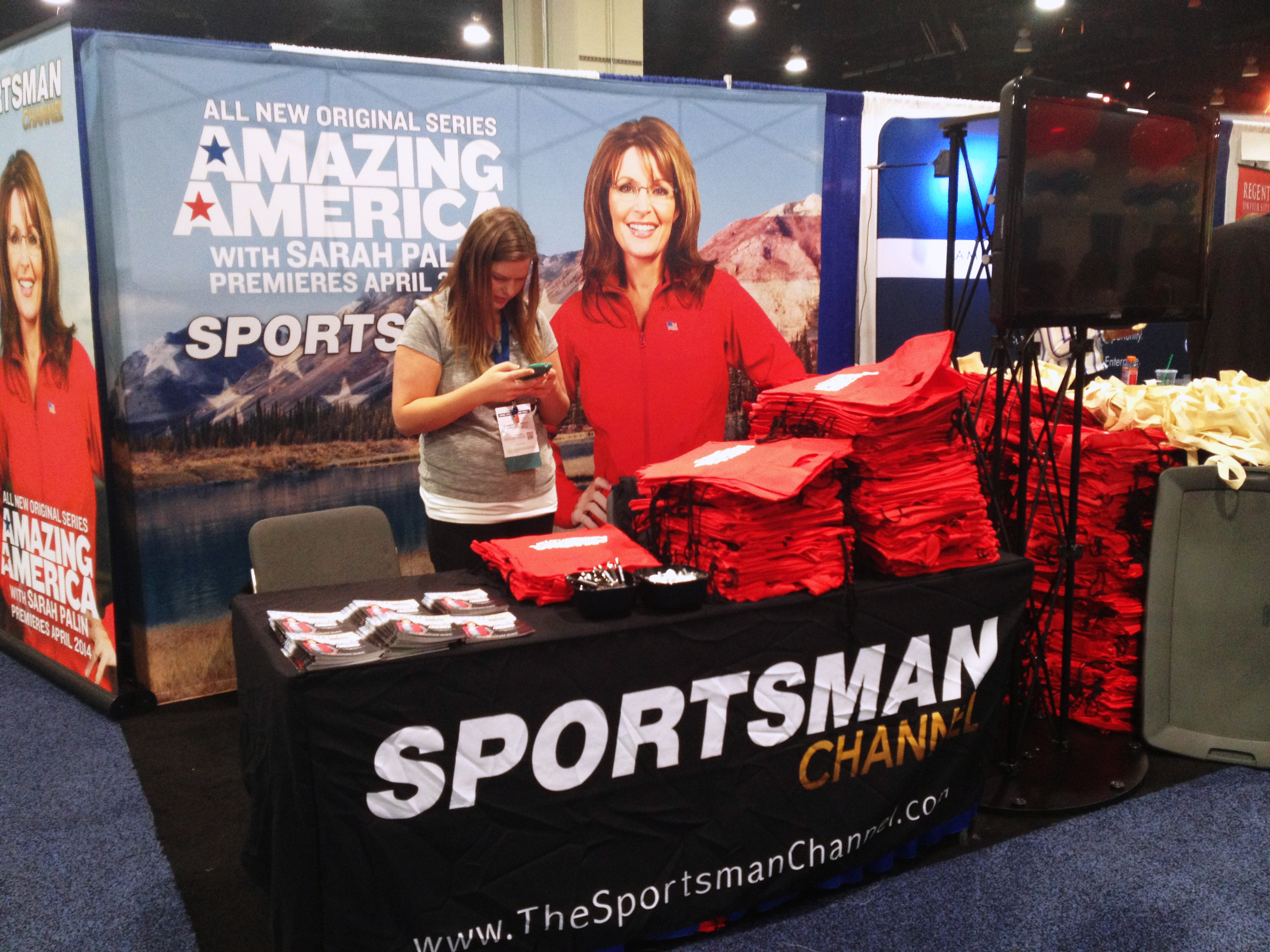 A booth at CPAC promotes Sarah Palin's latest cable television show, Amazing America.