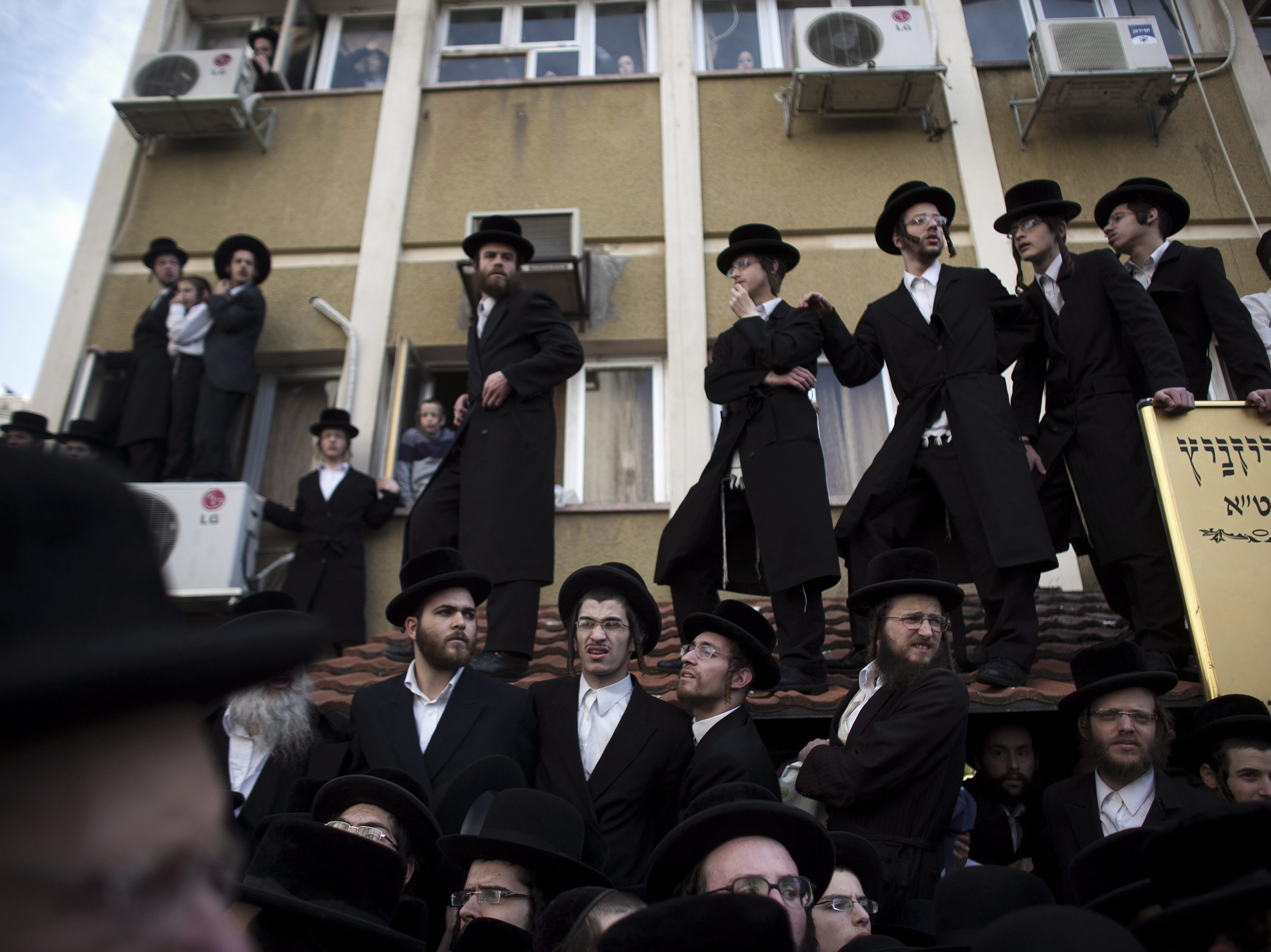 Ultra Orthodox Jewish men attend the funeral of Rabbi Moshe Yehoshua Hagar in Bnei Brak, outside Tel Aviv, in 2012. (EPA/Landov)