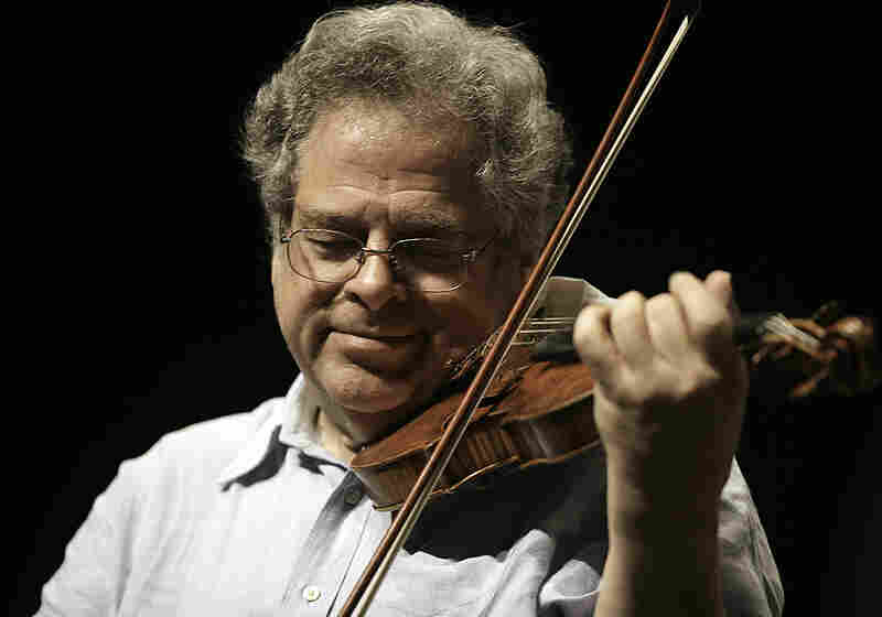 Itzhak Perlman plays his 1714 Soil Stradivarius violin in rehearsal with the East Texas Symphony Orchestra, at the University of Texas at Tyler, on April 4, 2009.
