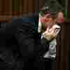 On Stand, A Weeping Pistorius Apologizes To Girlfriend's Family