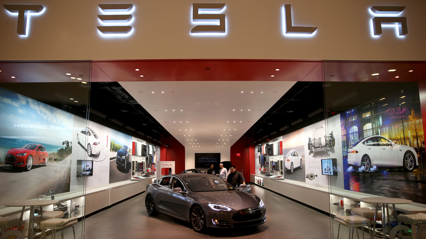 Tesla Swings At Direct-Sale Bans As Bigger Fight Awaits - NPR