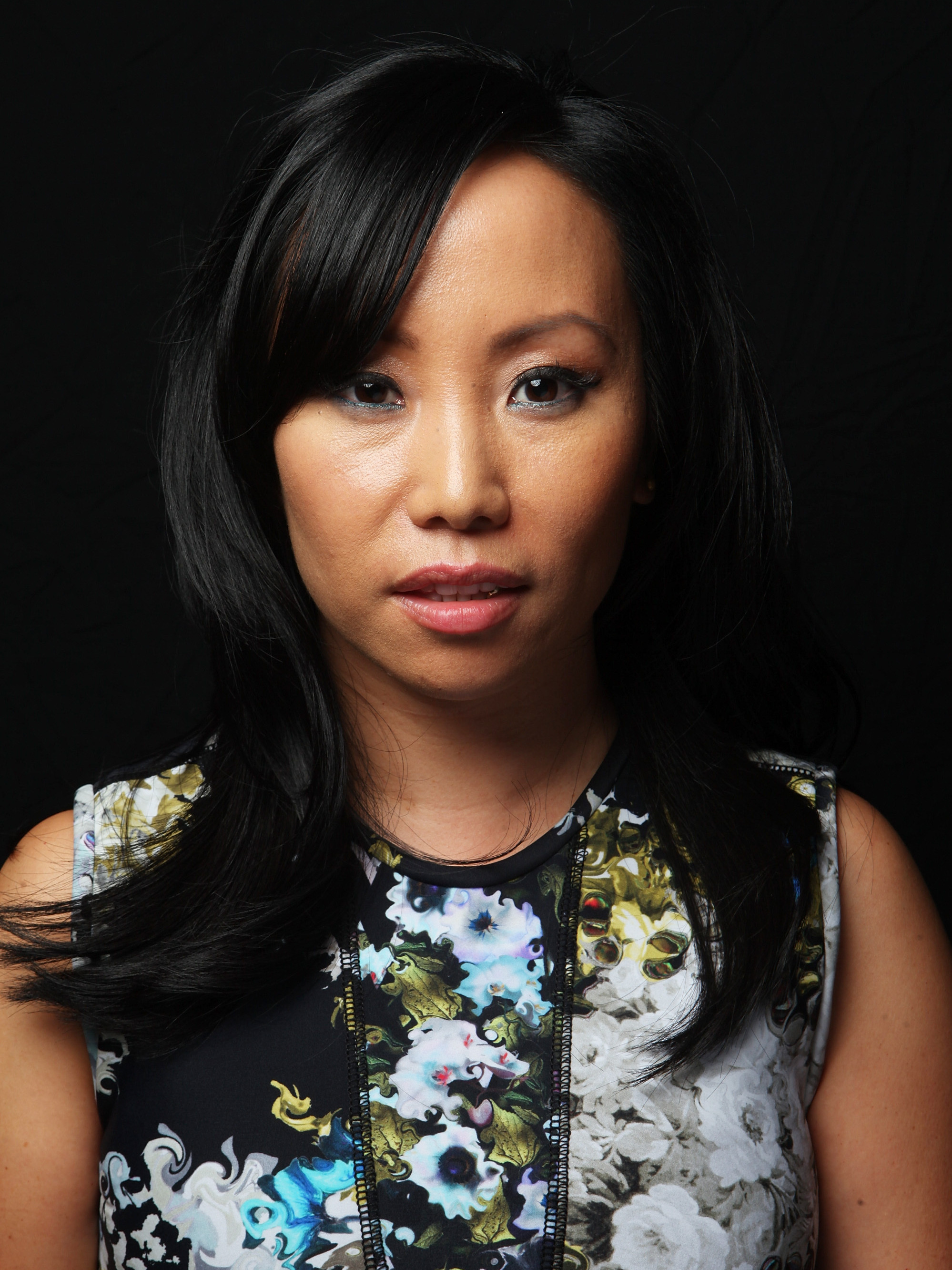 Minya Oh, who reviewed <em>Illmatic</em> in <em>The Source</em> in 1994 under the pen name Shortie and is now a radio personality on New York's Hot 97 who goes by Miss Info. Here she poses for a portrait backstage at a vitaminwater Fader uncapped event in 2012. (Getty Images)