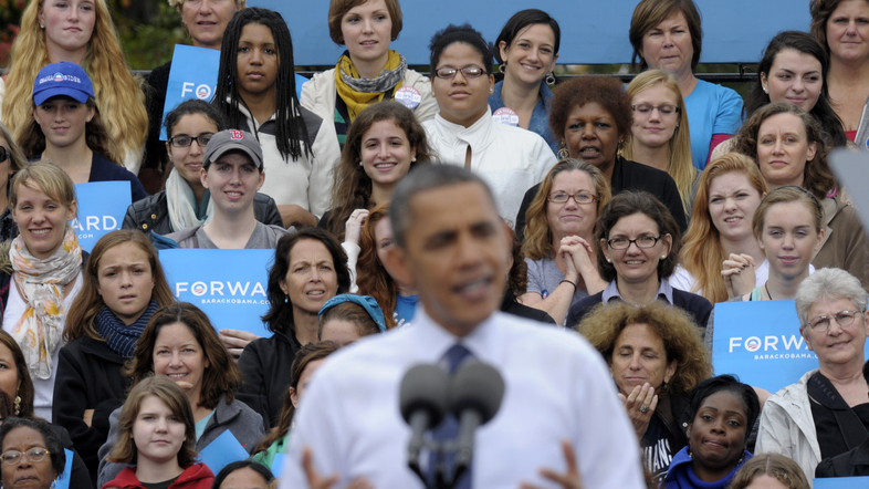 An audience, mostly women, listen behind President Barack Obama in Oct. 2012 as he speaks about the choice facing women in the election during a campaign event at George Mason University in Fairfax, Va. (Susan Walsh/AP)