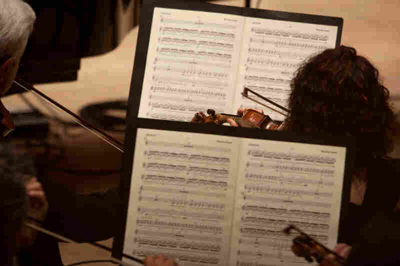 Become Ocean is scored for large symphony orchestra, including four harps. Adams says the orchestra is deployed as three separate ensembles. "It's really a piece for three orchestras," he says. "The different instrumental choirs are separated as widely as possible in the performance space."