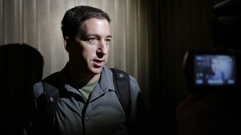 Reporter Glenn Greenwald speaks to reporters in Hong Kong on June 10, 2013, just days after publishing a series of reports about the NSA's mass surveillance programs. (Vincent Yu/AP)