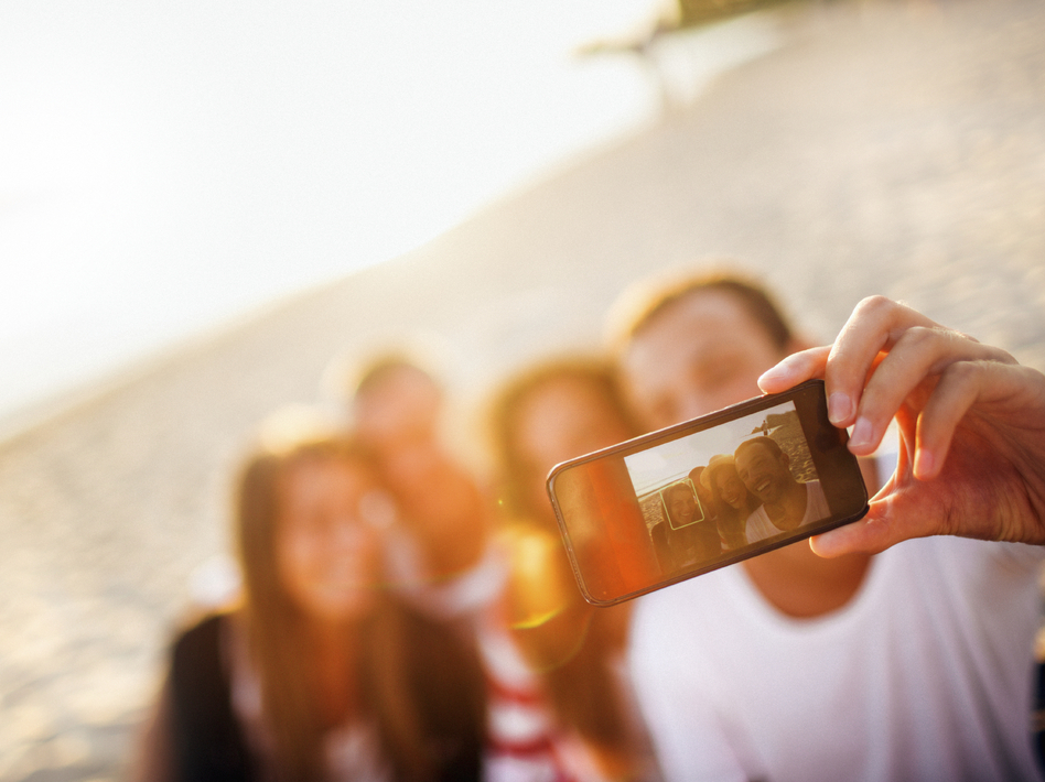 Selfie is one of the 150-plus new words added to Merriam-Webster's Collegiate Dictionary. (iStockphoto)