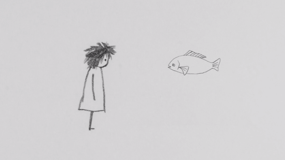 Xiangjun Shi stares at a fish.