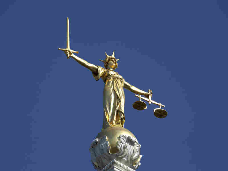 The statue of Justice atop the Old Bailey courthouse in London.
