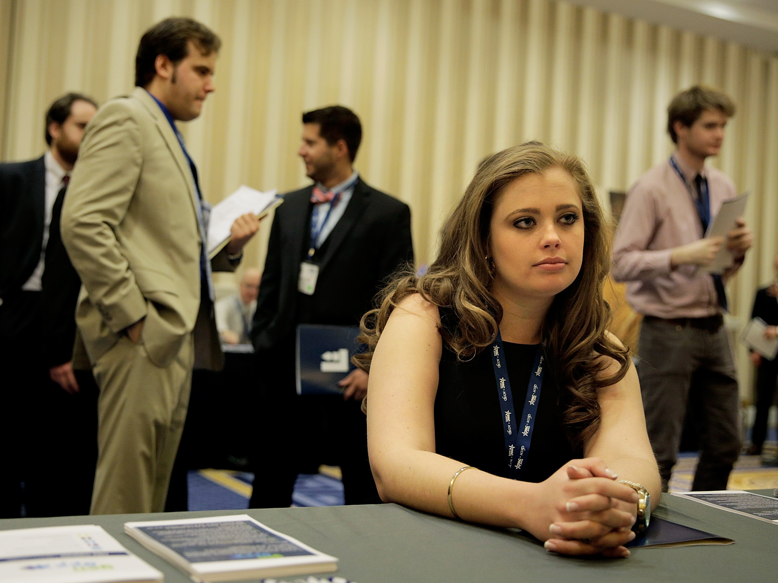Kaitlin Foran, a senior at the College of Charleston in South Carolina, meets with a prospective employer at a job fair at National Harbor in Maryland. (Getty Images)