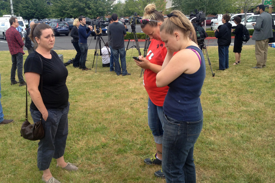 Parents and family members gather at the Cherry Park Safeway in Troutdale, Oregon.