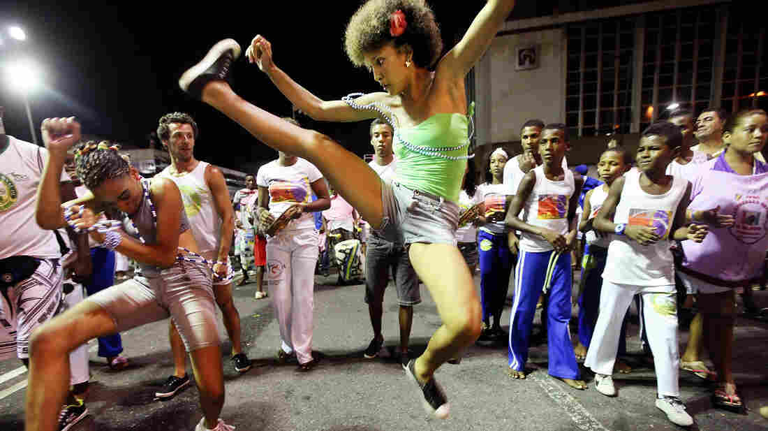 Brazilians perform capoeira on the first day of Carnival celebrations on Feb. 16, 2012, in Salvador, Brazil. Capoeira is a Brazilian martial art and dance form that was developed by slaves in the region.