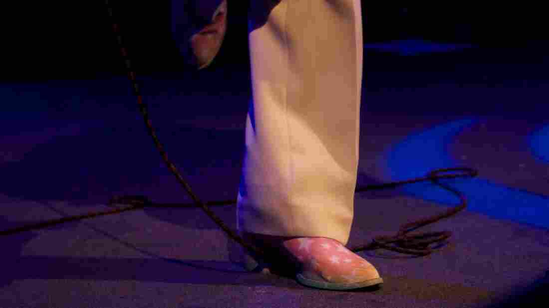 Which musician wears these custom-decorated shoes on stage these days?