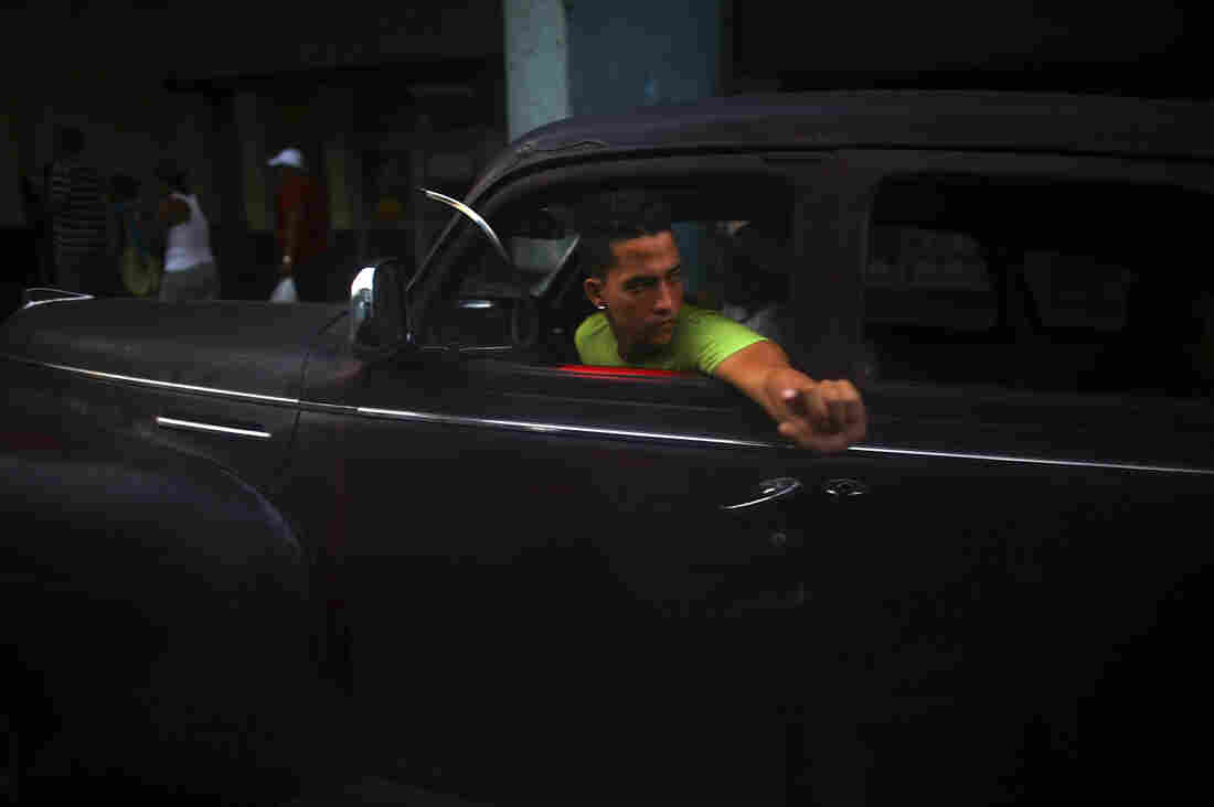 04: Man in bright green shirt w/ finger