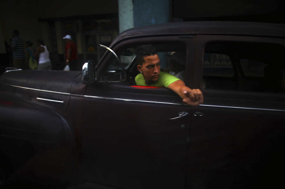 04: Man in bright green shirt w/ finger