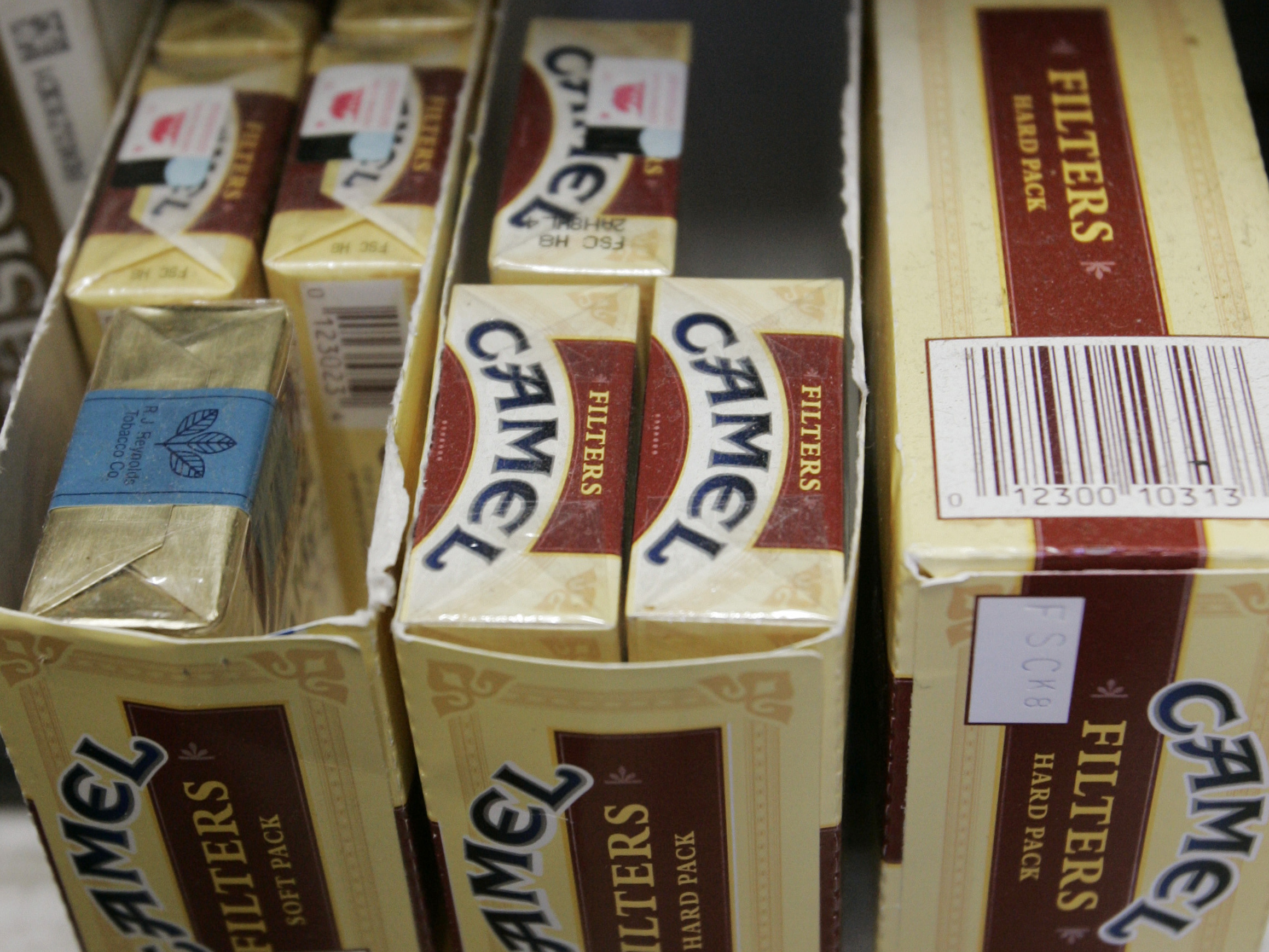 Camel cigarettes, an R.J. Reynolds brand, are seen on display at JJ&F Market in in Palo Alto, Calif. The company has vowed to appeal a $23 billion judgement.