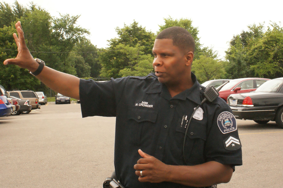 Officer Michael Crowder says his roots are too deep to leave Detroit, but he knows younger officers who were lured away by better pay. (Dawn Uhl-Zifilippo)