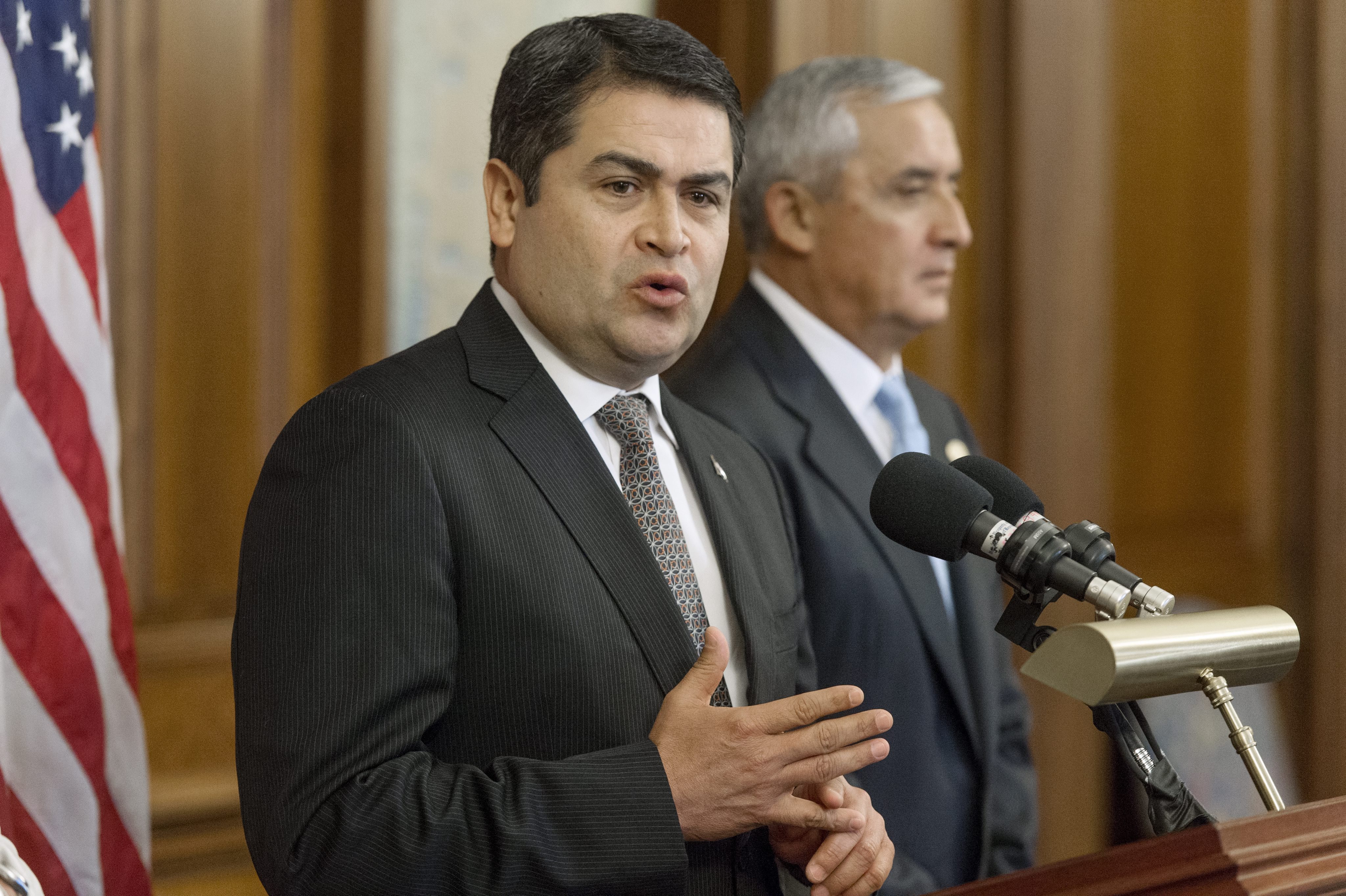 President of Honduras Juan Orlando Hernandez, left, delivers remarks on immigration beside President of Guatemala Otto Perez Molina.