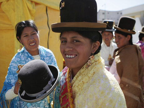 An Aymara woman prepares to take part in a pageant in La Paz, Bolivia, in 2013. Jaqi-Aru, a community of volunteers is working on translating the Facebook interface in the indigenous language of Aymara.