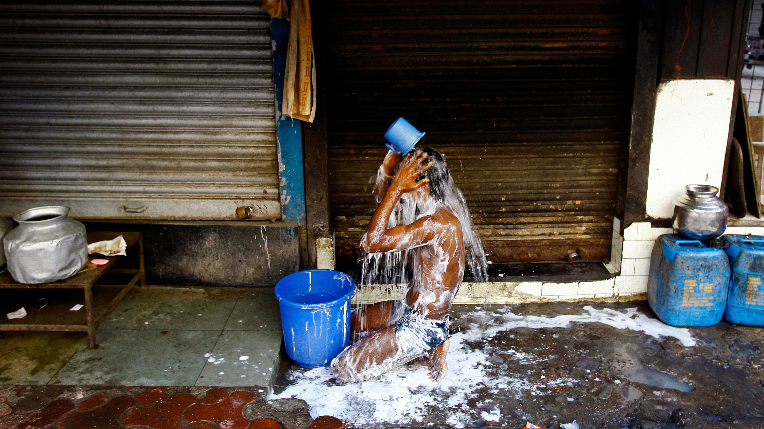 In India's Sultry Summer, Bucket Bathing Beats Indoor Showers : Goats ...