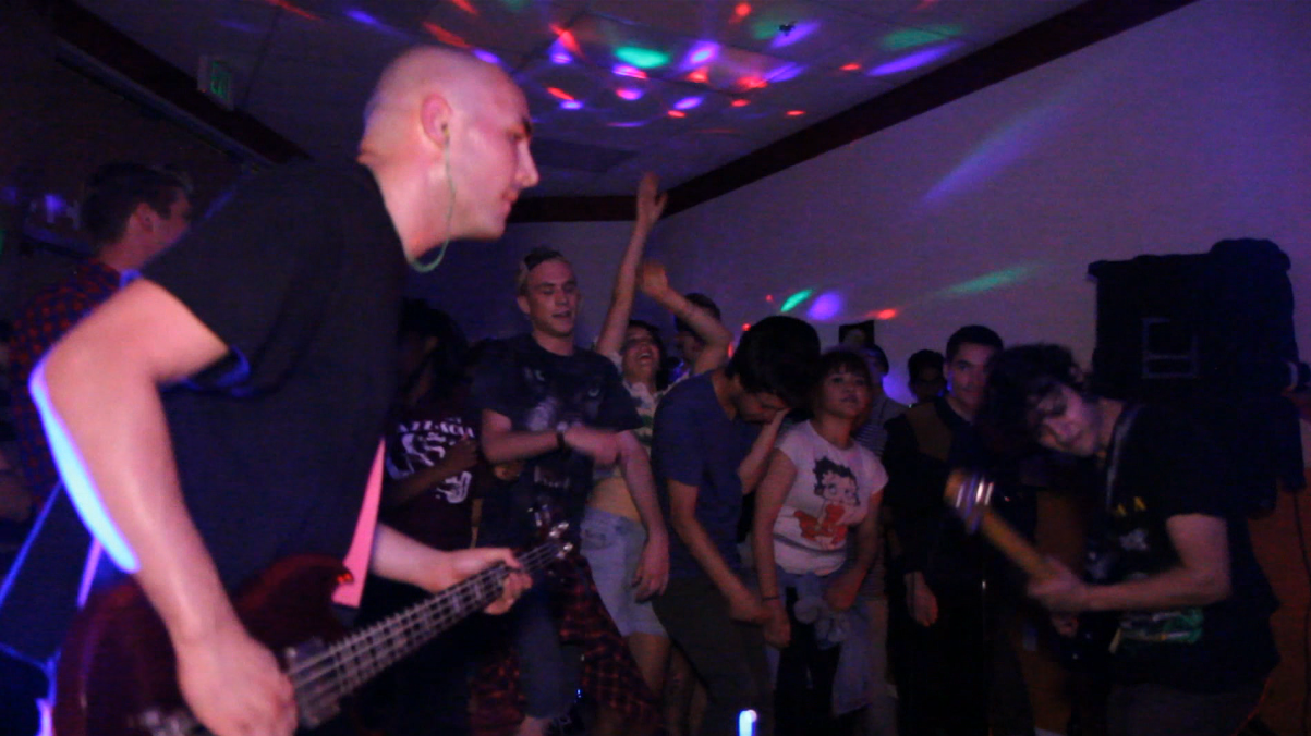 An empty strip mall storefront is one of the only places for young bands to play in Stockton, Calif. (Youth Radio)