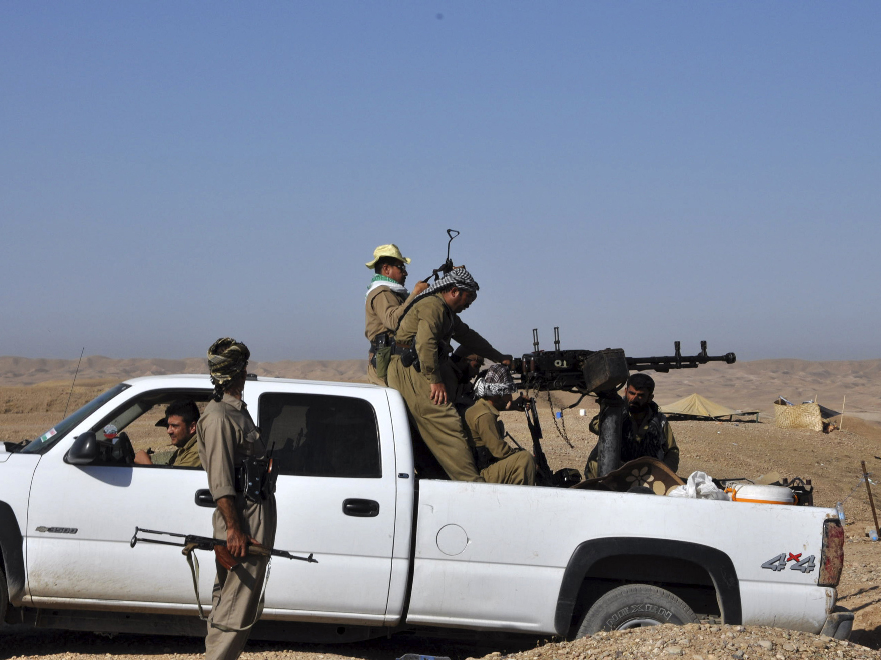 Members of Kurdish security forces take part during an intensive security deployment after clashes with militants of the Islamic State, in Jalawla, Diyala province, on Friday.