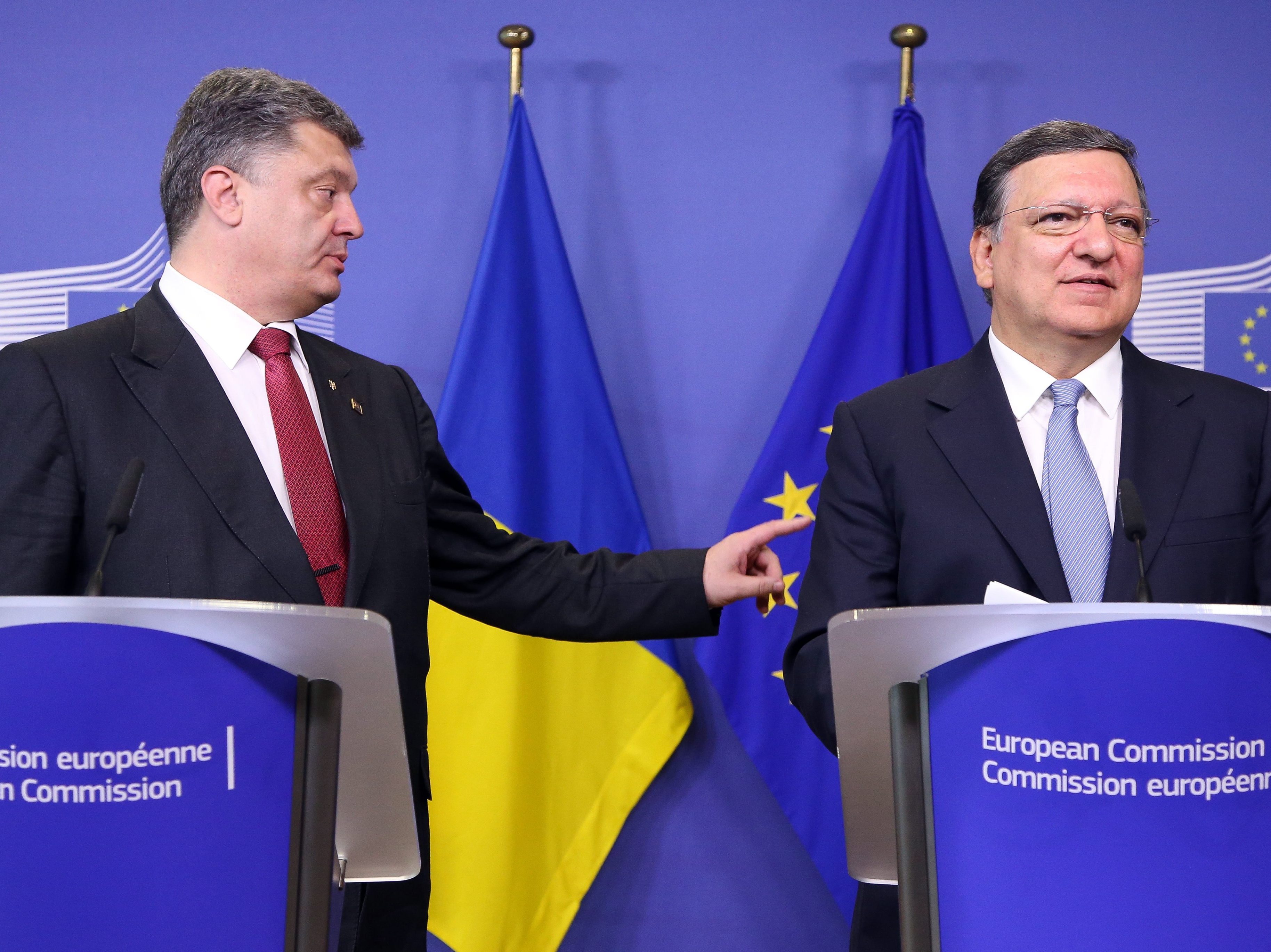 President of Ukraine Petro Poroshenko (left) and EU Commission President Jose Manuel Barroso during a news conference after a meeting at the EU Commission headquarters in Brussels on Saturday to discuss the crisis in eastern Ukraine.