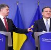 President of Ukraine Petro Poroshenko (left) and EU Commission President Jose Manuel Barroso during a news conference after a meeting at the EU Commission headquarters in Brussels on Saturday to discuss the crisis in eastern Ukraine.