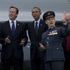 President Obama stands alongside British Prime Minister David Cameron, center left, NATO Secretary General Anders Fogh Rasmussen, second left, Croatian President Ivo Josipovic, left, Romanian President Traian Basescu, right, and RAF Group Captain David Bentley, second right, during a flypast at the NATO summit at the Celtic Manor Resort in Newport, Wales on Friday.