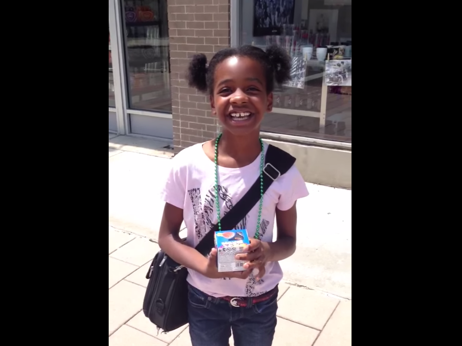 Asia Newson is Super Business Girl. (Screenshot from: https://www.youtube.com/watch?v=ADd-g5E9UcM)