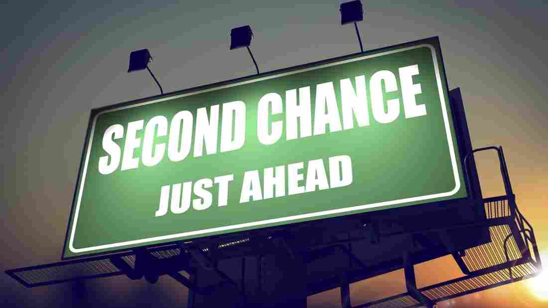 Photo illustration of a green billboard on a Rising Sun background.