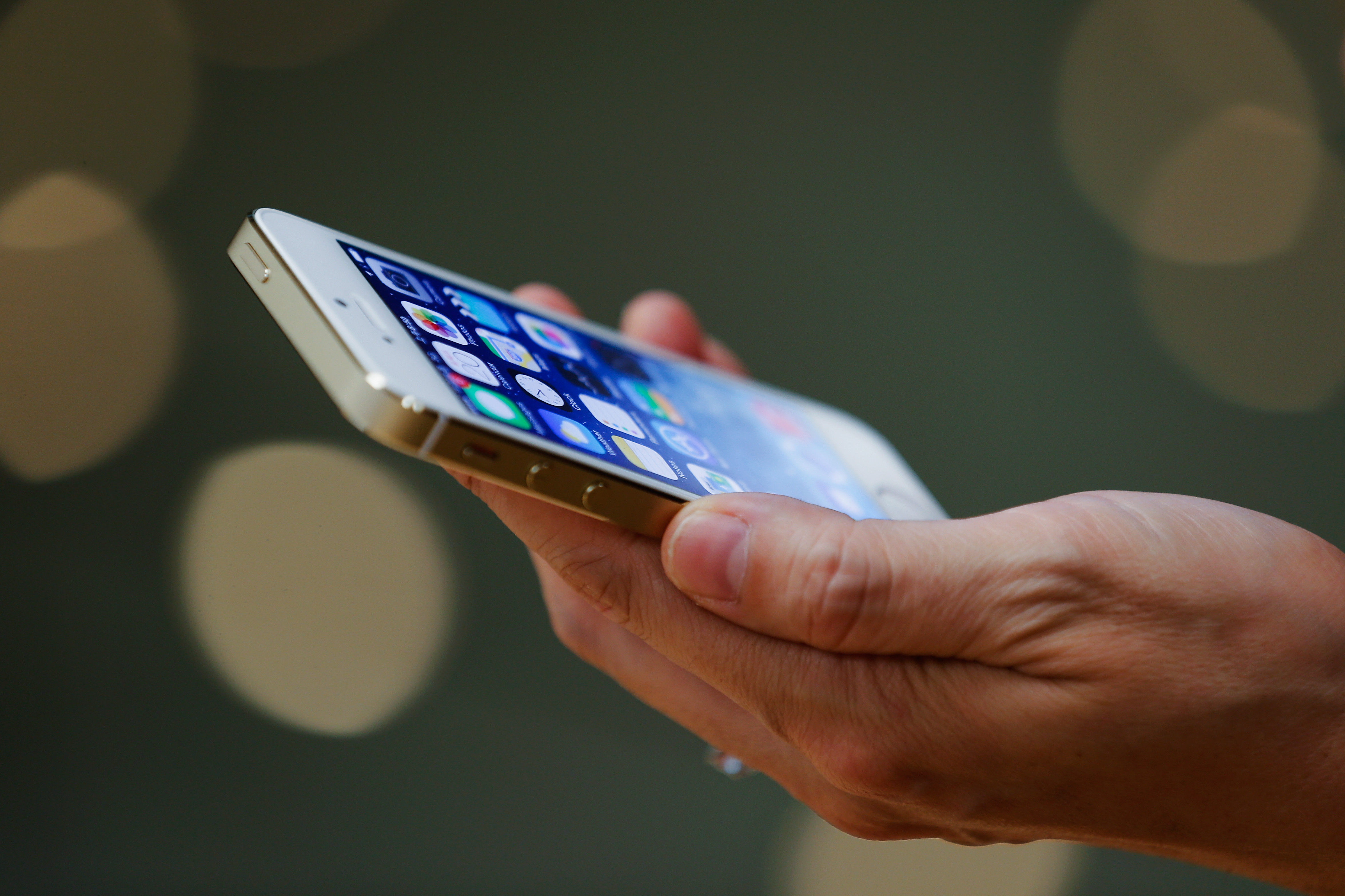 A customer inspects the new iPhone.