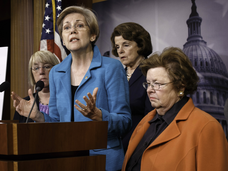 "Who does Washington work for?" asked Sen. Elizabeth Warren, D-Mass., after her bill that would let people refinance student debt was shot down in June. It was a question she came back to repeatedly in an NPR interview on the Goldman Sachs bailout and federal regulation of the financial sector. (J. Scott Applewhite/AP)